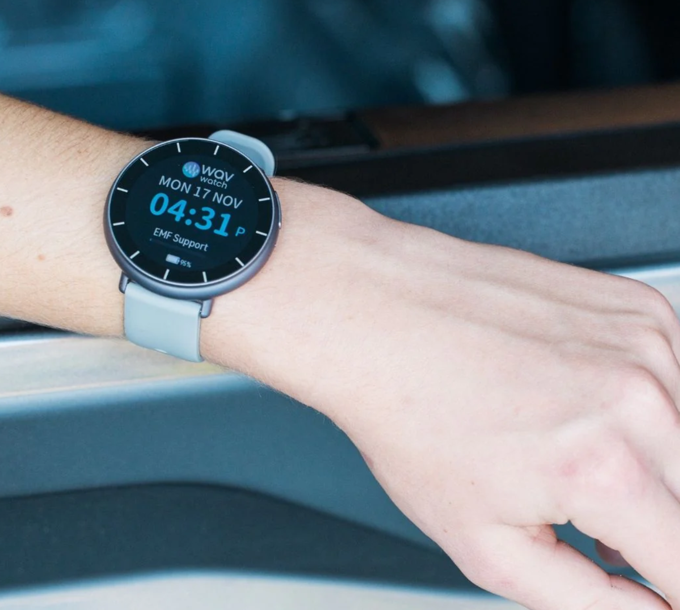 wavwatch on a wrist with a blurred background