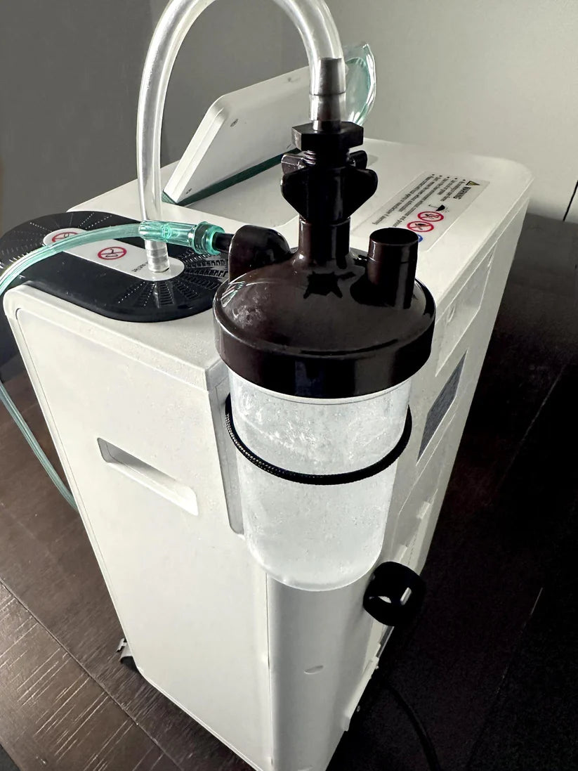 Baxstar Oxygen Generator view of the water pump and connecting tubes