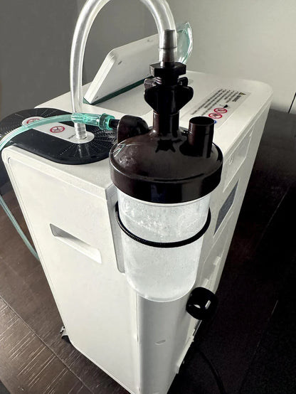 Baxstar Oxygen Generator view of the water pump and connecting tubes