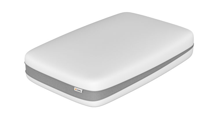 A white luxury sleeping pillow with a modern design, featuring a silver coolant gel on one side and an antimicrobial cover.