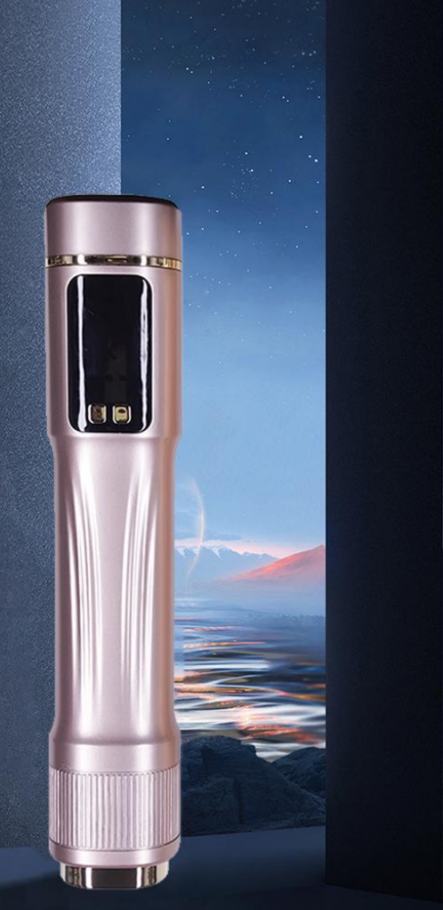 Tall cylindrical device with digital display against a scenic background