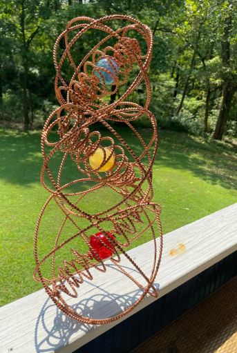 Stacked copper Omnicore tower with crystal spheres 